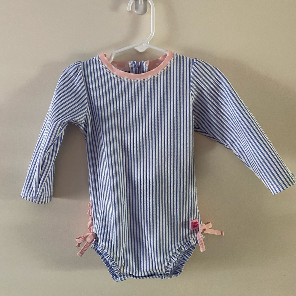 Ruffle Butts long-sleeve rashguard swim suit